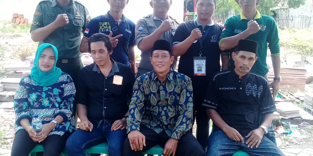 Babinsa Bersama Bhabinkamtibmas Polsek Cipondoh Mengamankan Pemilihan Ketua RT