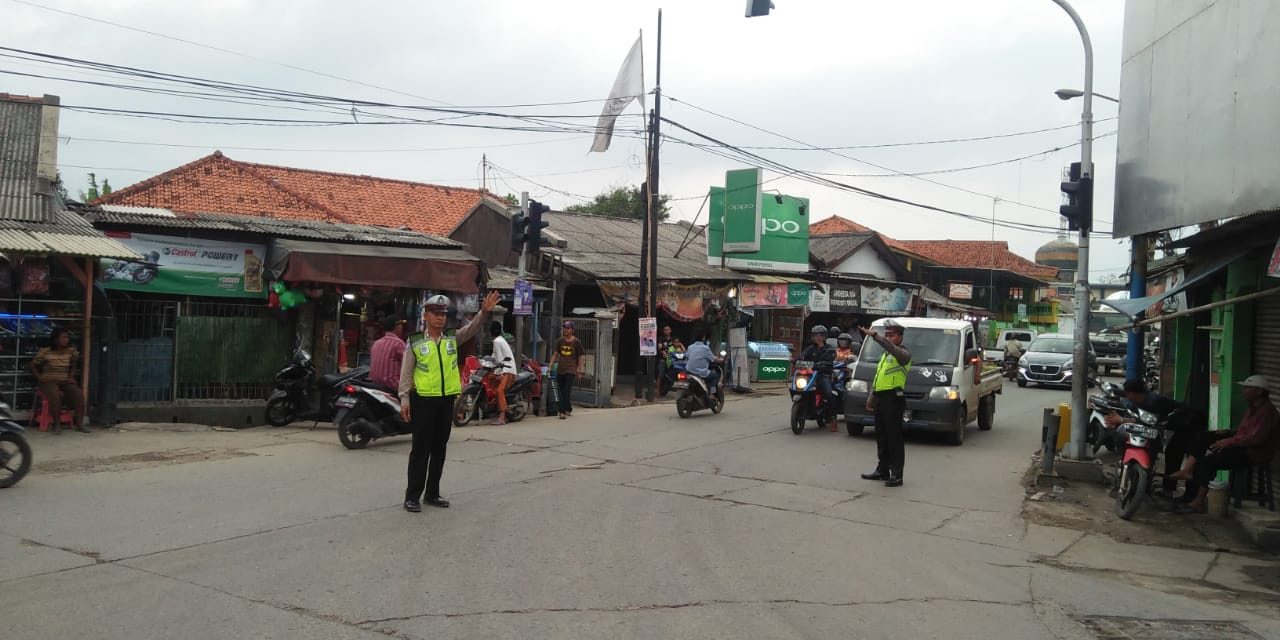 Unit Lalu Lintas Polsek Teluknaga Urai Kepadatan Arus Lalu Lintas Dititik Rawan Macet