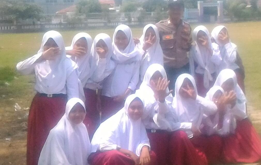 Bhabinkamtibmas Desa Pangkalan Bripka Willy Kunjungan Polkiss ke SDN 1 Pangkalan