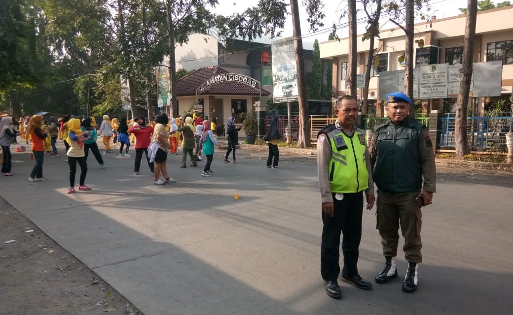 Anggota Unit Lantas Polsek Jatiuwung Lakukan Pengamanan Car Free Day di Jl. Prambanan