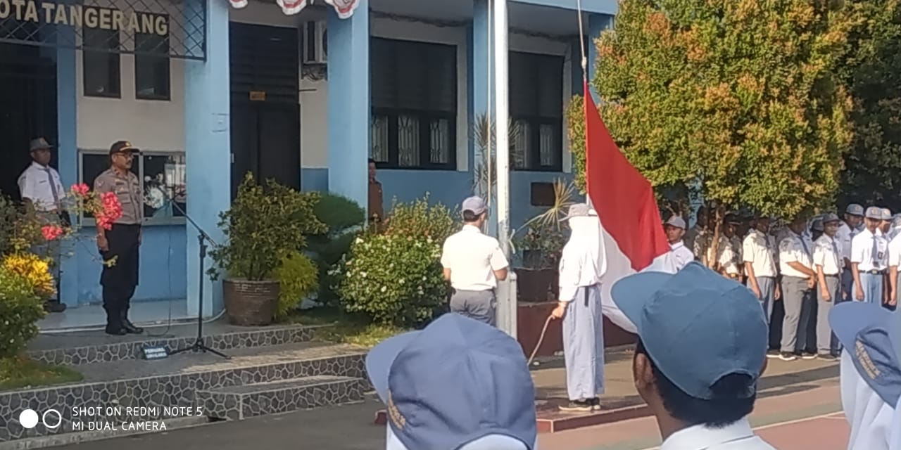 Kanit Binmas Polsek Jatiuwung, IPDA AGUS NURDIN Jadi Pembina Upacara di SMAN 15 Tangerang