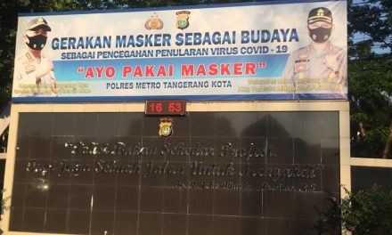 Polrestro Tangkot Melakukan Sosialisasi Himbauan “Ayo Pakai Masker” Melalui Spanduk